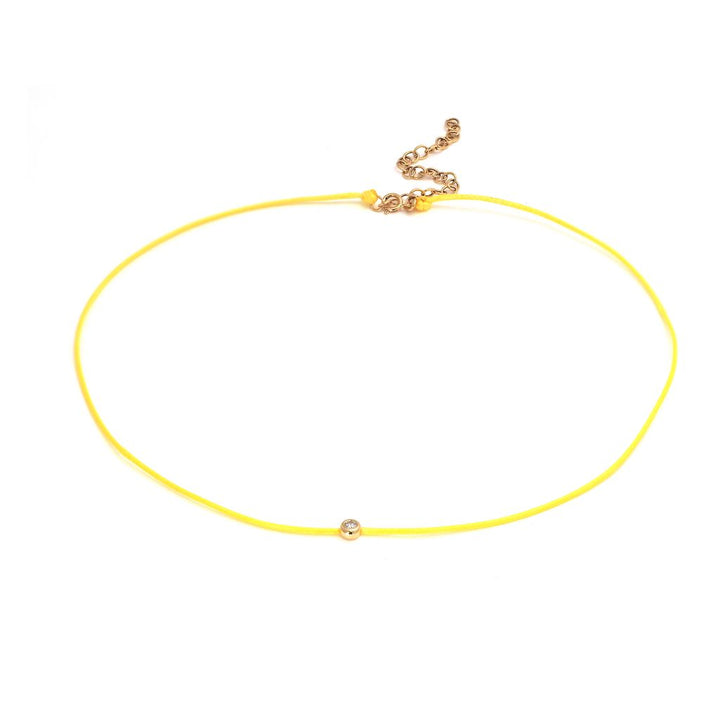 14K Diamond Bezel Necklace On Yellow Cord